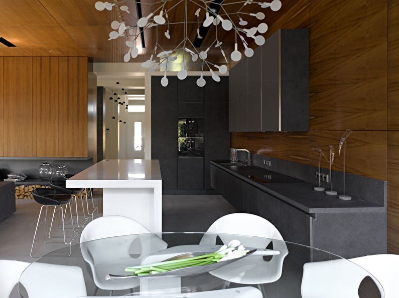 Conception d'une cuisine spacieuse dans le style du minimalisme - photo