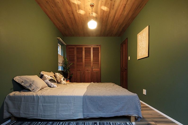Zielona sypialnia na poddaszu - architektura wnętrz