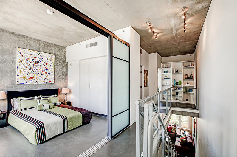 Interior design della camera da letto di stile del sottotetto - foto