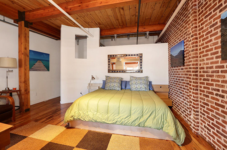 Innenarchitektur des Schlafzimmers des Loft-Stils - Foto