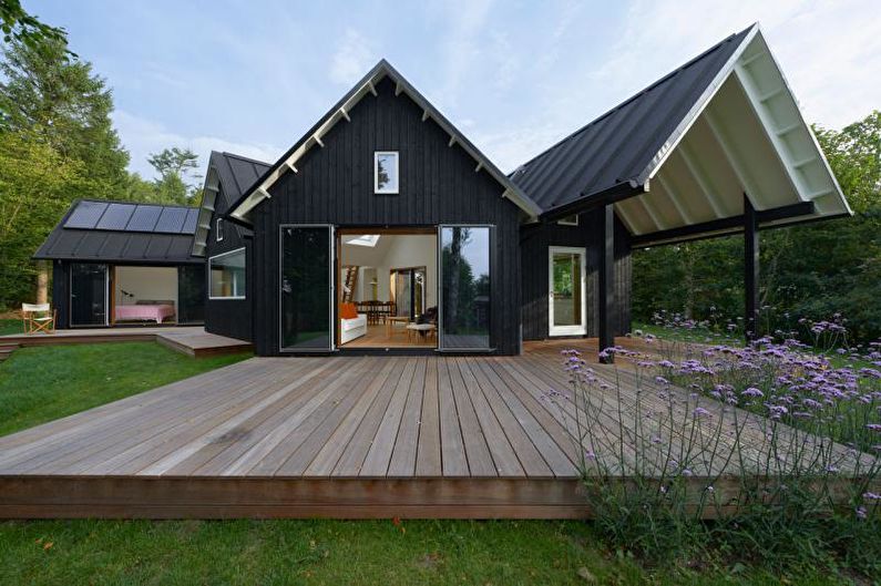 Porche pour une maison de campagne de style scandinave - photo