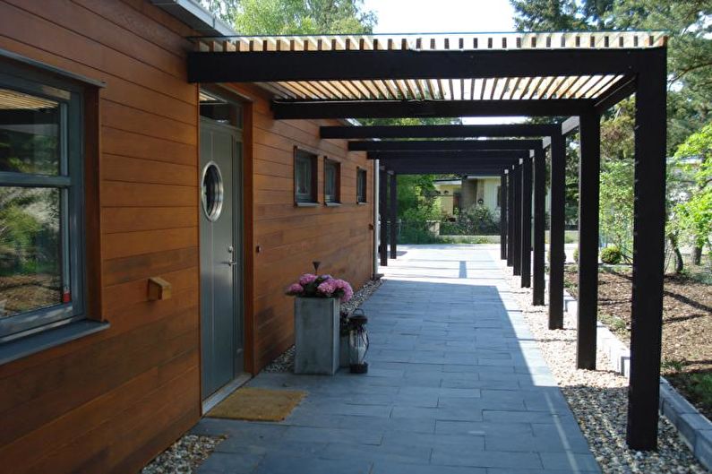 Veranda egy skandináv stílusú parasztház számára - fénykép