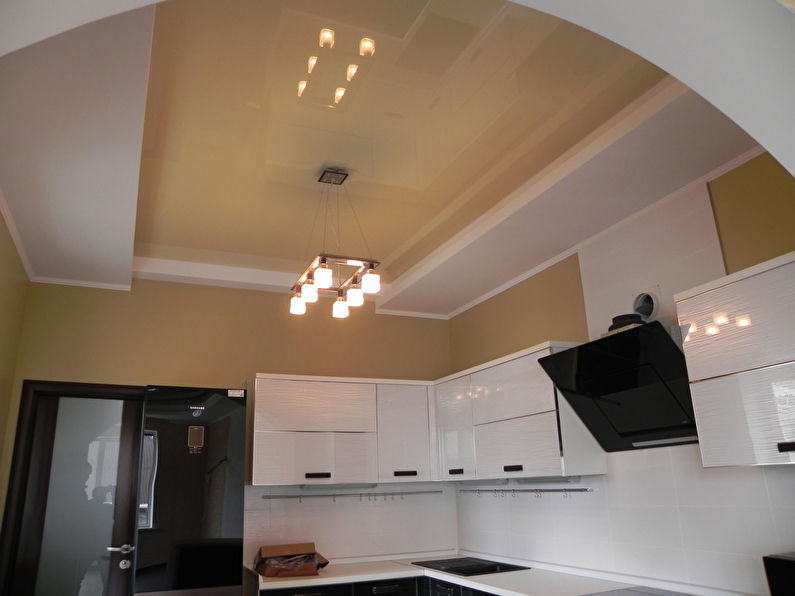Stretch ceiling in the kitchen - photo