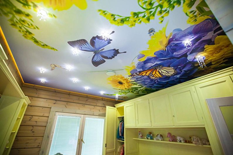 Stretch ceiling in a nursery - Butterflies and flowers
