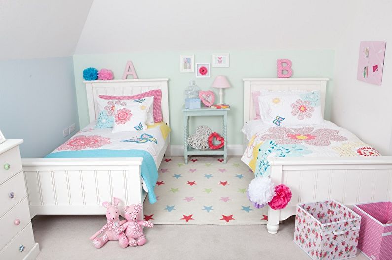 Diseño interior de una habitación infantil para dos niñas - foto