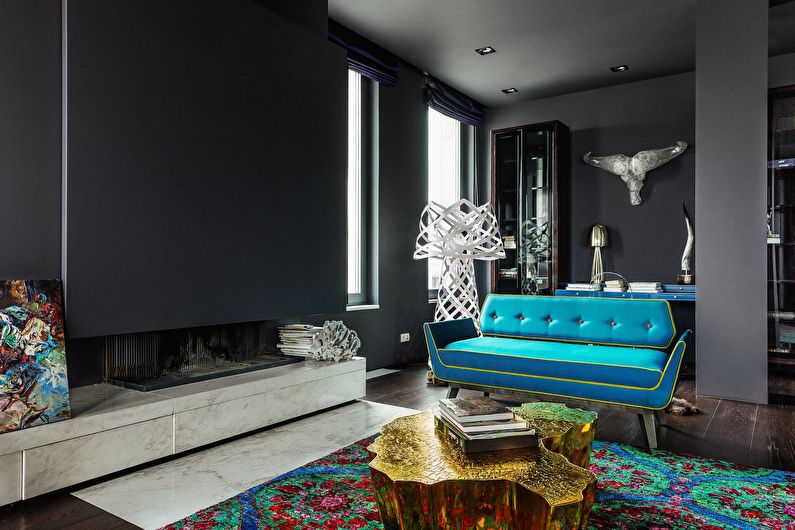 Die Farbkombination im Innenraum des Wohnzimmers - schwarz mit türkis