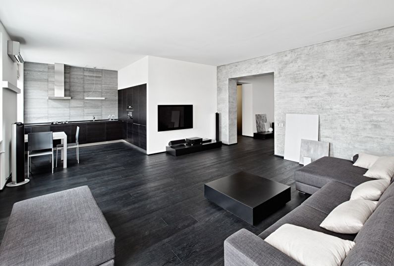 La combinación de colores en el interior de la sala de estar: negro con blanco.