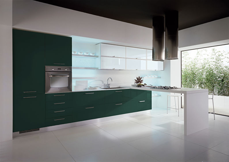 Kombinasjonen av farger i det indre av kjøkkenet - grønt med hvitt og svart
