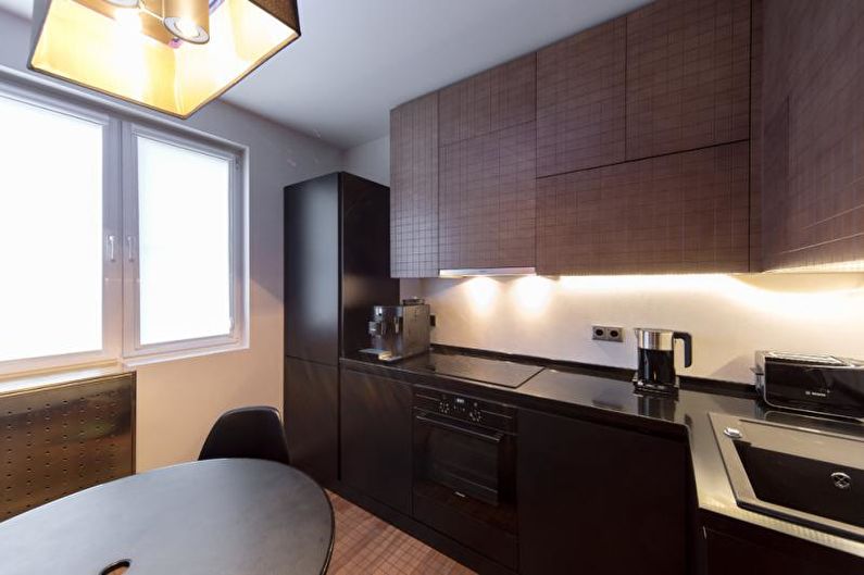 Vakkert kjøkkenfoto - Minimalistisk kjøkken med gyldne nisjer