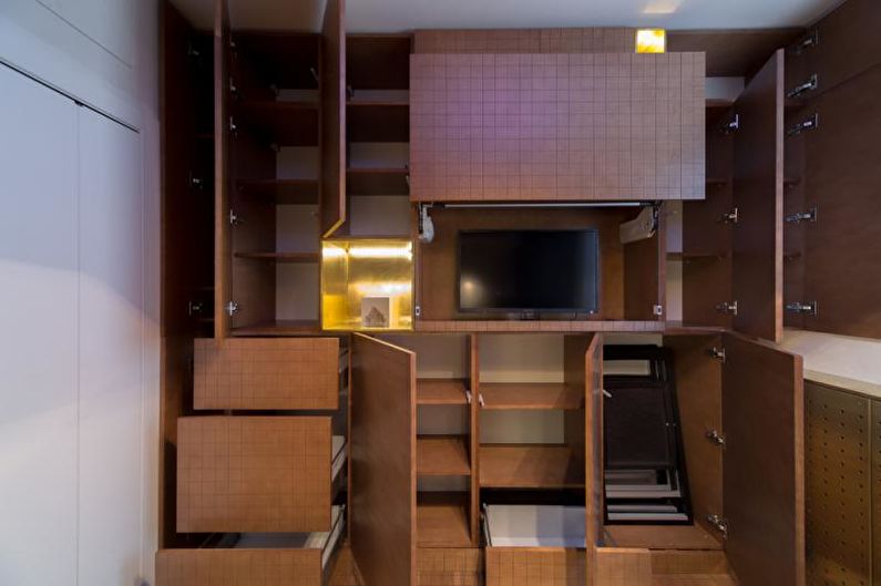 Beautiful cuisine photo - Minimalistic kitchen with golden niches