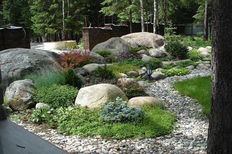 Jardín de piedra - Macizo de flores en la cabaña, ideas para el diseño del paisaje