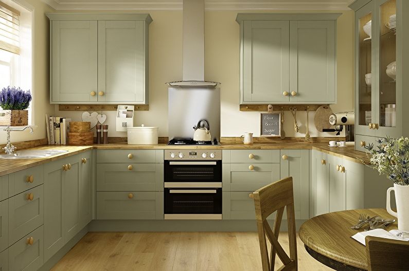 Kitchen interior design in olive tones - photo