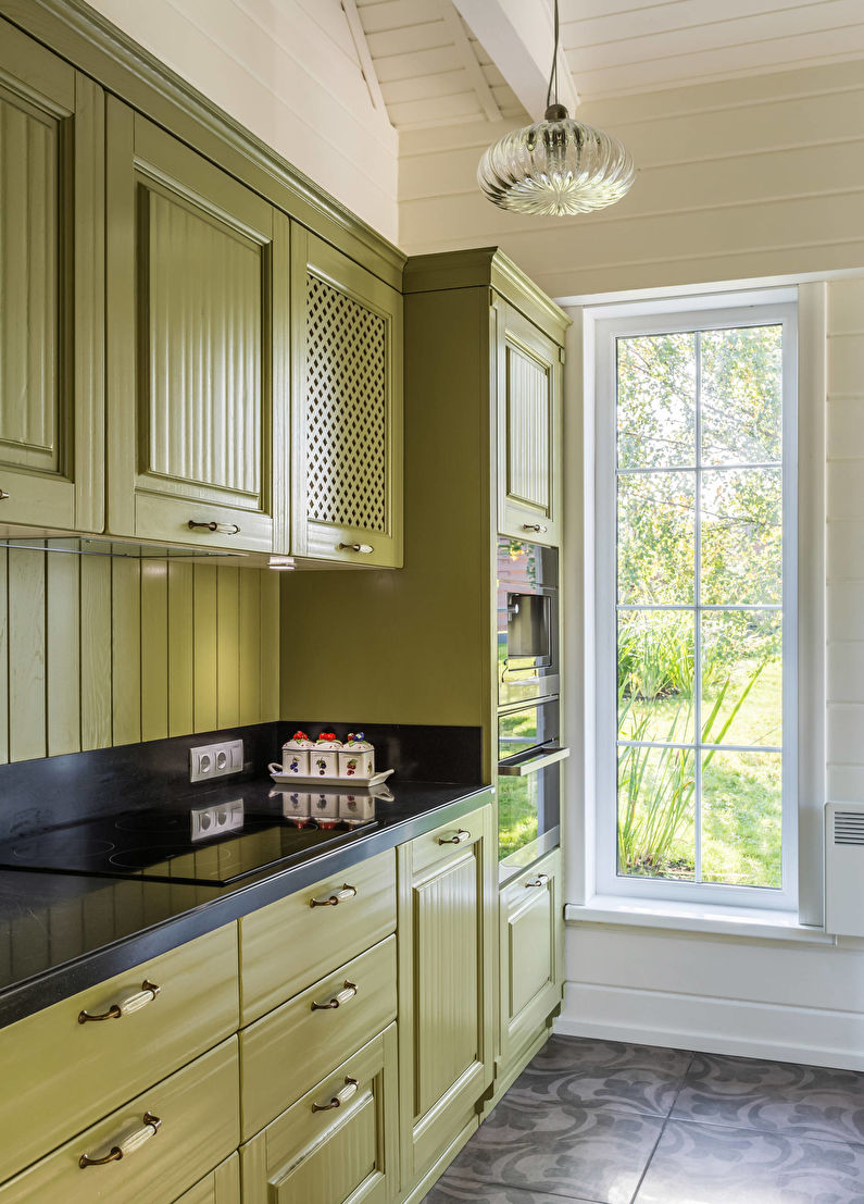 Kitchen interior design in olive tones - photo