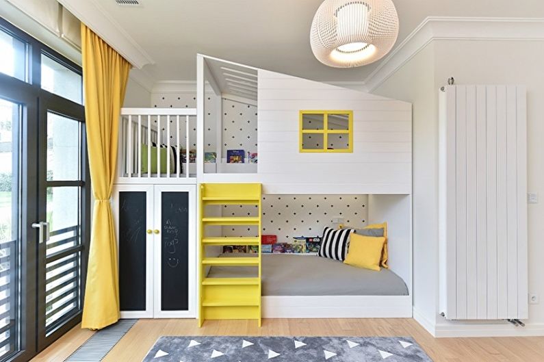 Design interior al unei camere pentru copii pentru un băiat și o fată - fotografie