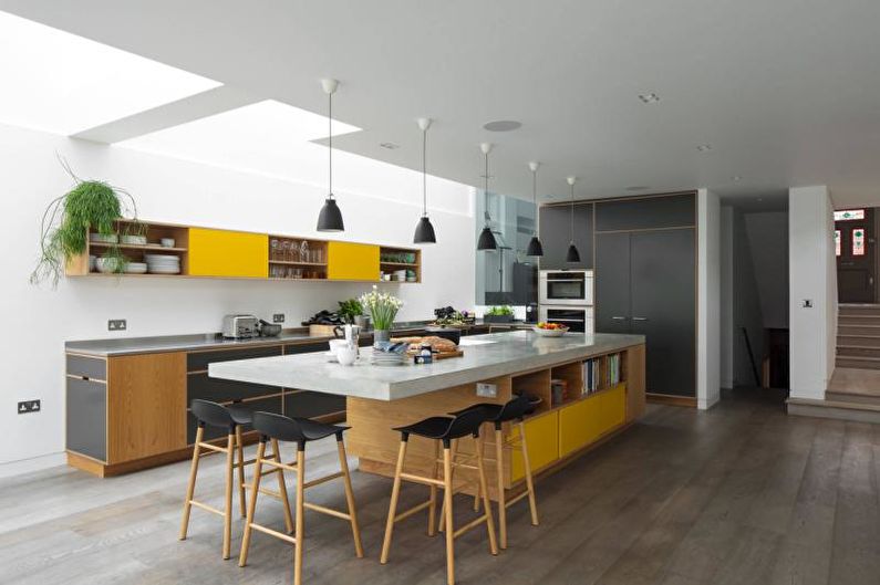 Design interiéru kuchyně ve žluté barvě - foto