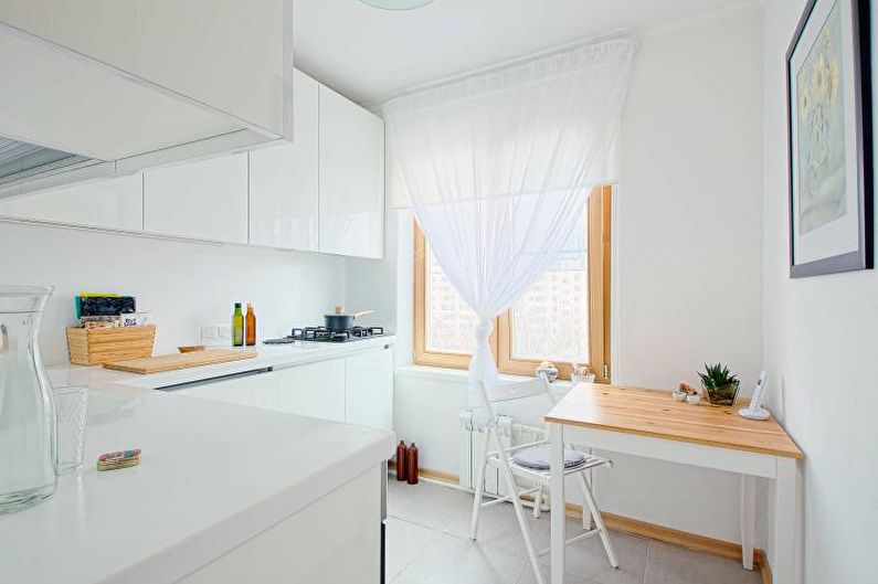 Дизајн ентеријера кухиње у белој боји - фотографија