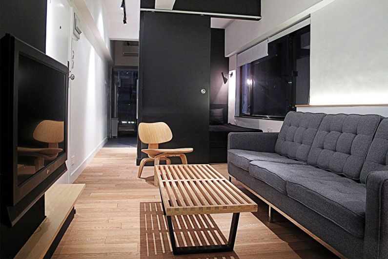 Design eines Studio-Apartments im Stil des Minimalismus