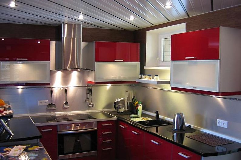Rött och svart kök - Interiördesignfoto