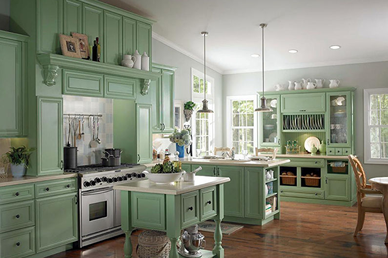Green color in the interior of the kitchen - photo