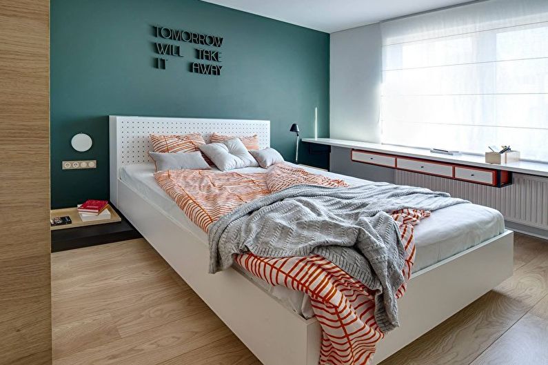 Green color in the bedroom interior - photo