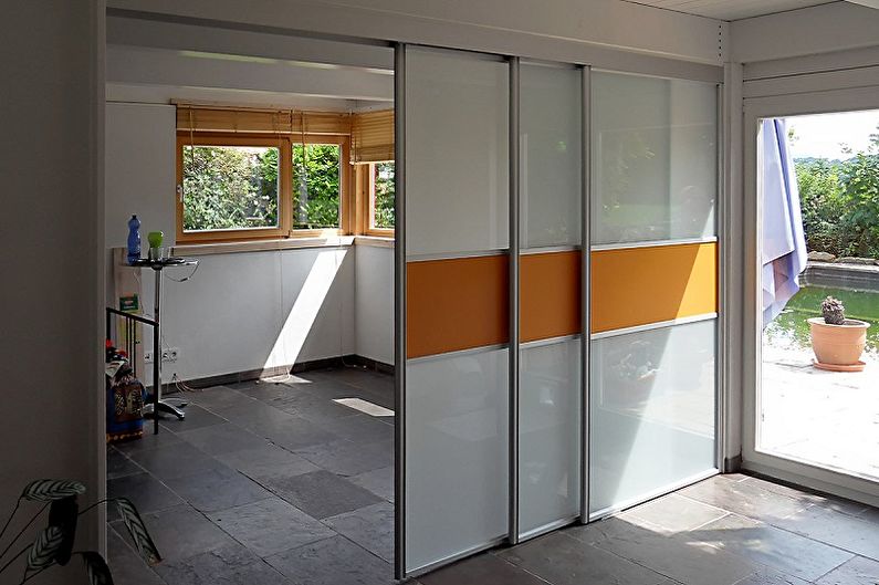 Types of interior sliding doors by type of movement - Cascading