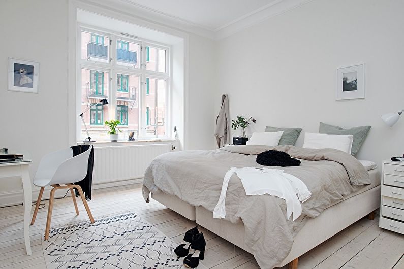 Camera da letto nella foto in stile scandinavo - Interior Design