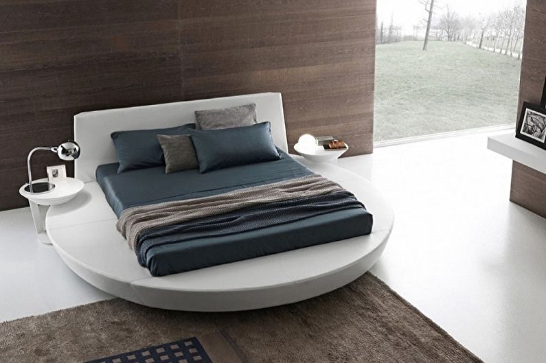 A hálószobában lévő kerek ágyak típusai - Téglalap alakú ágy a kerek dobogón