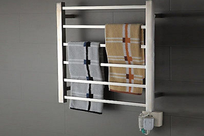 Typer av väggmonterade tvättmaskiner - Stationär elektrisk torktumlare