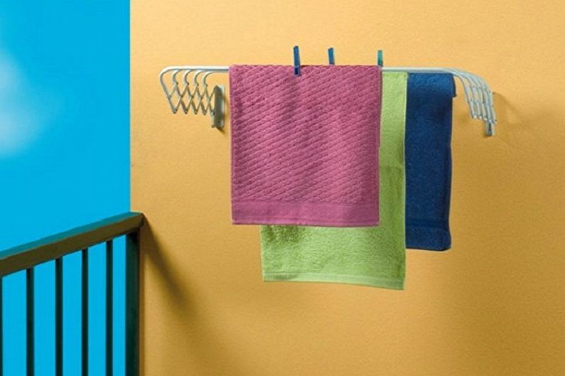 Escolhendo um secador de roupas na parede