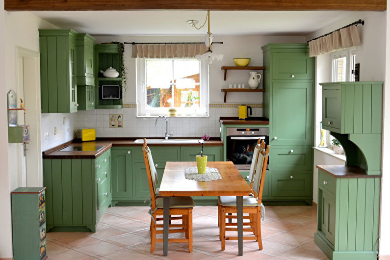 Pistasjfarge i det indre av kjøkkenet - Designfoto