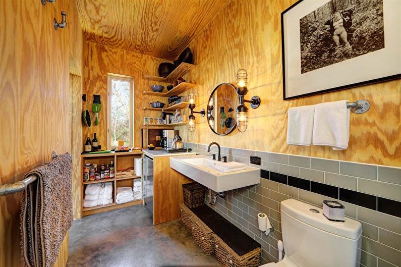 Aménagement intérieur d'une salle de bain de style loft - photo