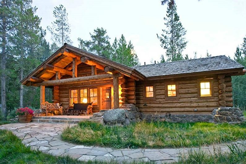 Модерни дизайни на къщи от дървен материал - Ловният дом от заобления дървен труп
