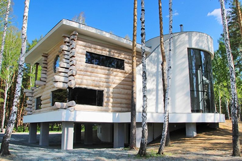 Modernūs rąstinių namų projektai - namas pagamintas iš rąstų modernaus stiliaus