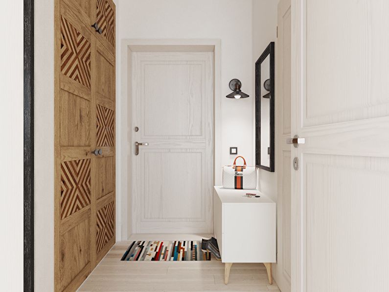 Interiør i en liten leilighet på 30 m2 i skandinavisk stil