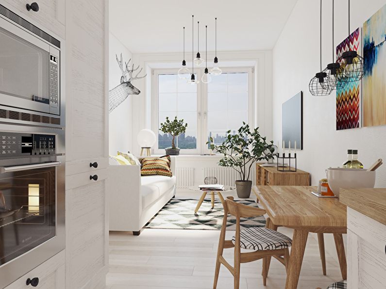 Interiør i en liten leilighet på 30 m2 i skandinavisk stil