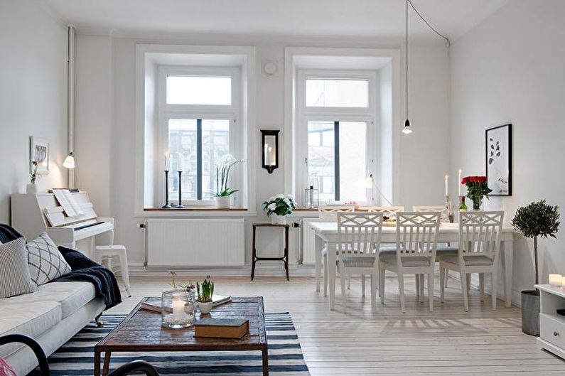 غرفة المعيشة البيضاء على الطراز الاسكندنافي - التصميم الداخلي