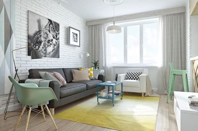 Zaļā skandināvu stila dzīvojamā istaba - interjera dizains