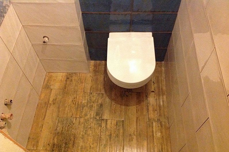 Design of the toilet in Khrushchev - Floor decoration