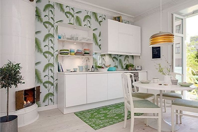 Interior design of a white-green kitchen - photo