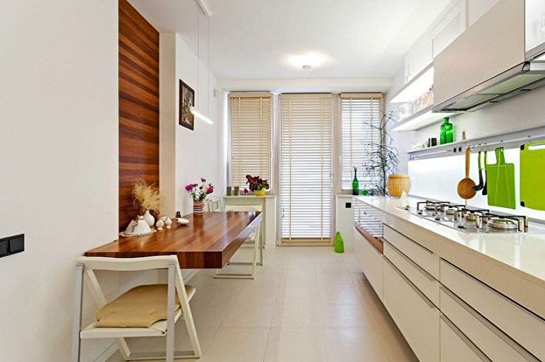 Design de interiores de uma cozinha branco-verde - foto